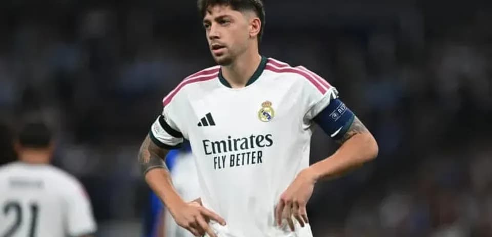Real Madrid player with captain's armband on pitch
