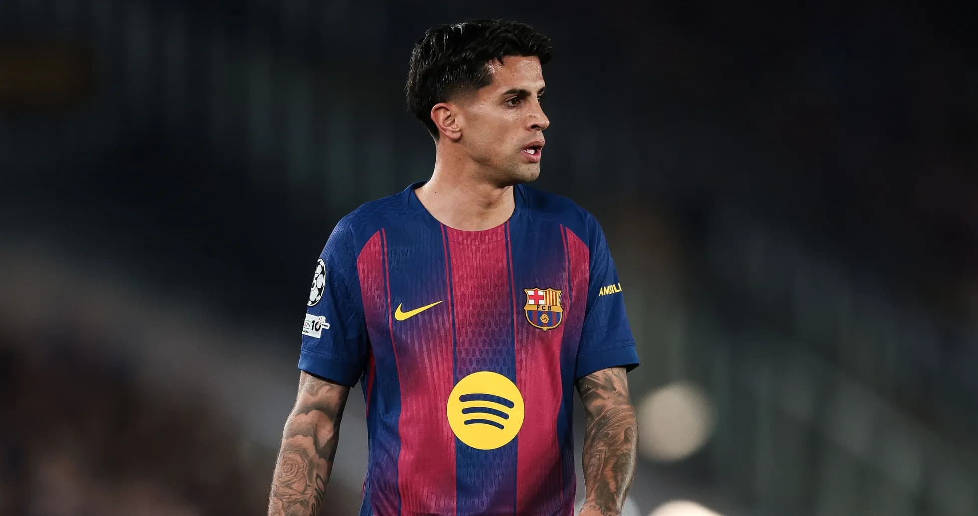Player wearing FC Barcelona jersey during match
