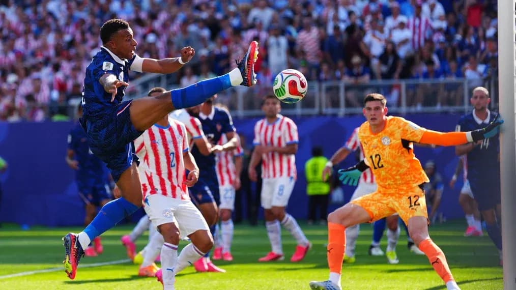 Player attempting to kick the ball near goal