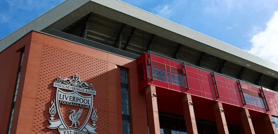 Exterior view of Anfield stadium with Liverpool FC logo