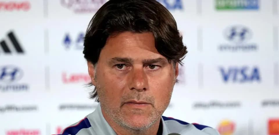 Manager speaking at press conference podium