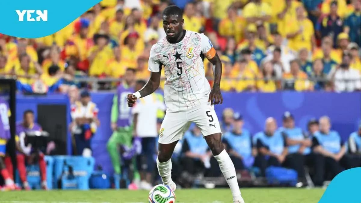Ghana player dribbling the ball during match