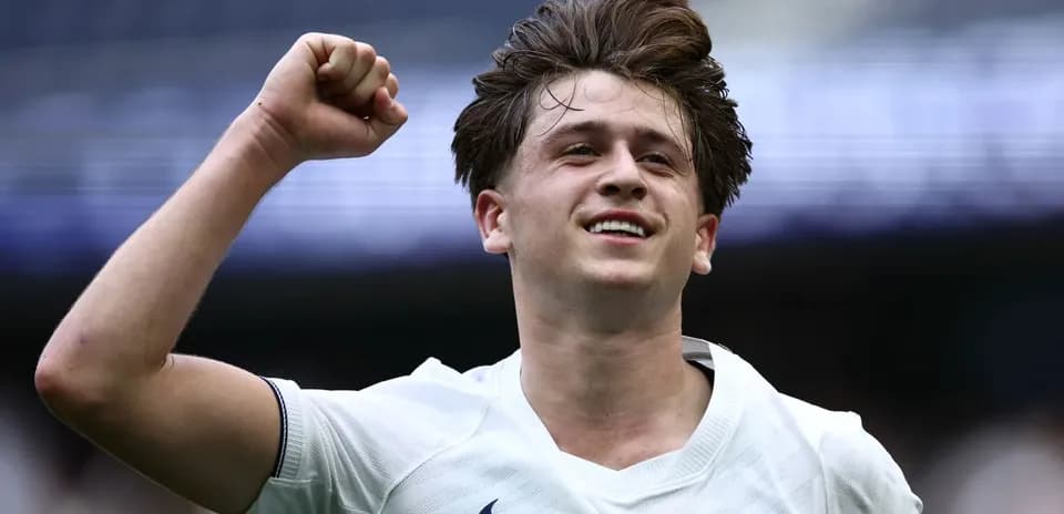 Player celebrating with raised fist after scoring