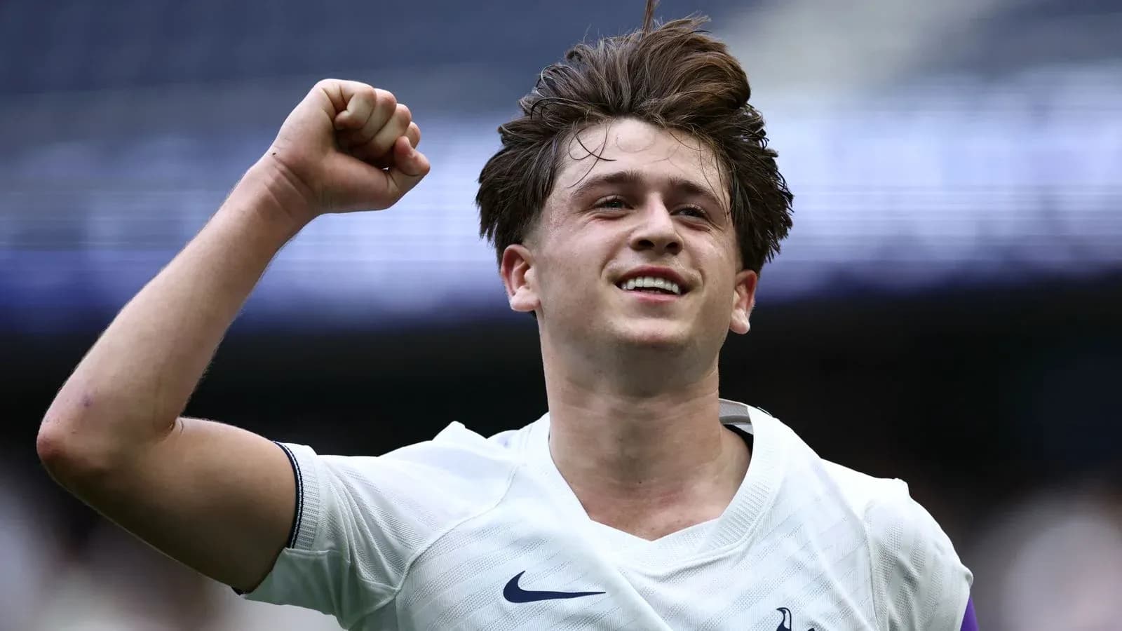 Player celebrating with raised fist after scoring