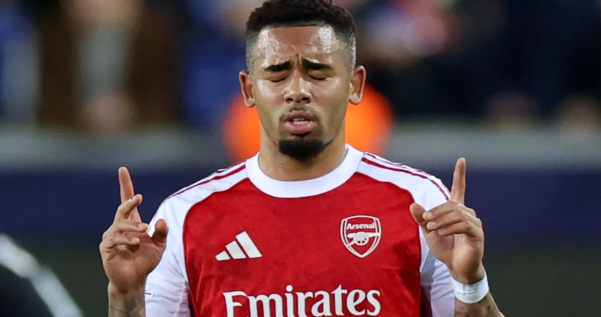 Player with Arsenal jersey gestures on the field
