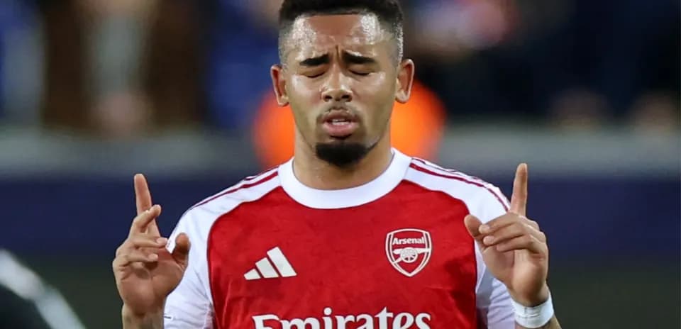 Player with Arsenal jersey gestures on the field