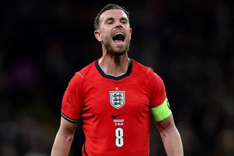 Player celebrating in England kit during match