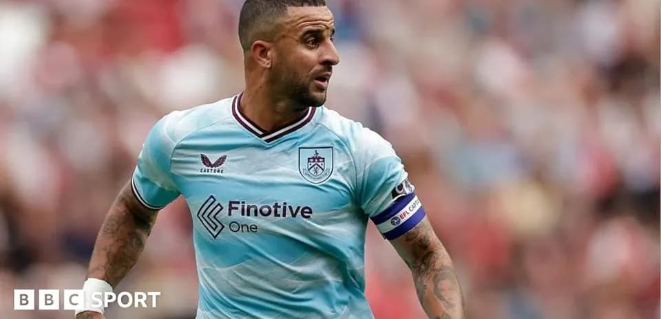 Player in light blue kit running during match