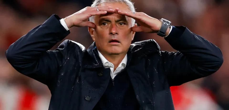 Coach gesturing during match from the sidelines