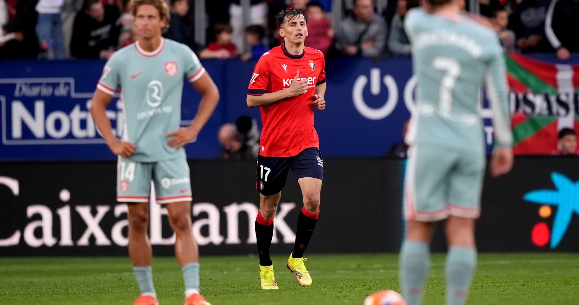Osasuna players during La Liga match against Atletico Madrid