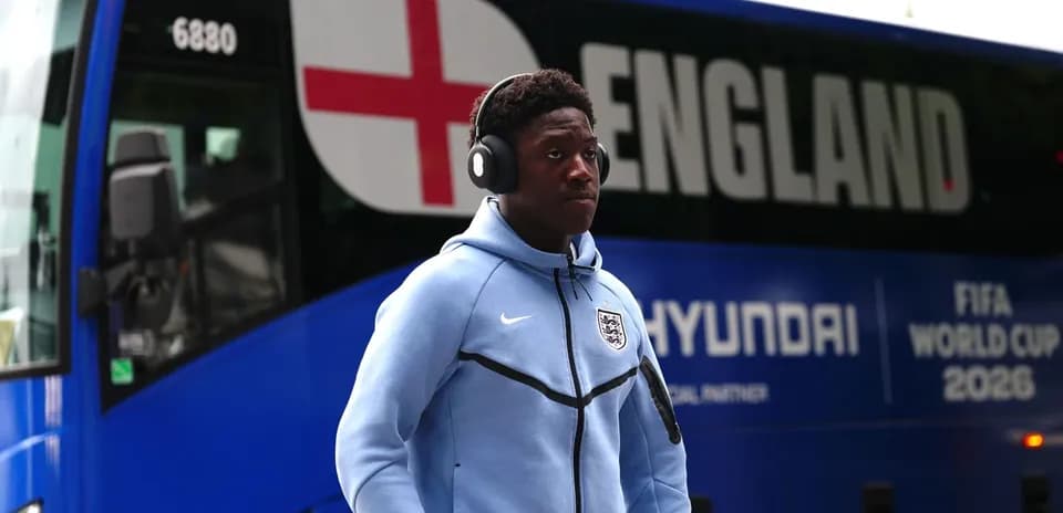 Player walking near England team bus before match