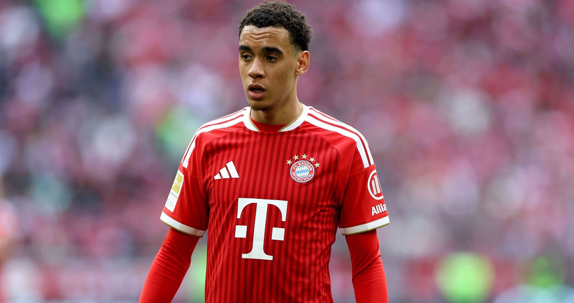 Player wearing Bayern Munich jersey on the field