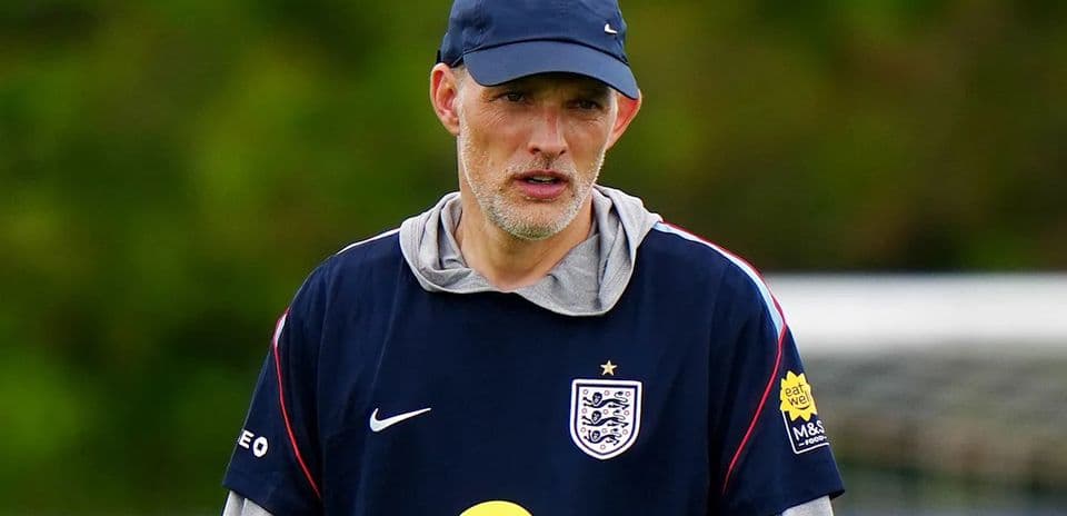 Coach observing during training session with England team