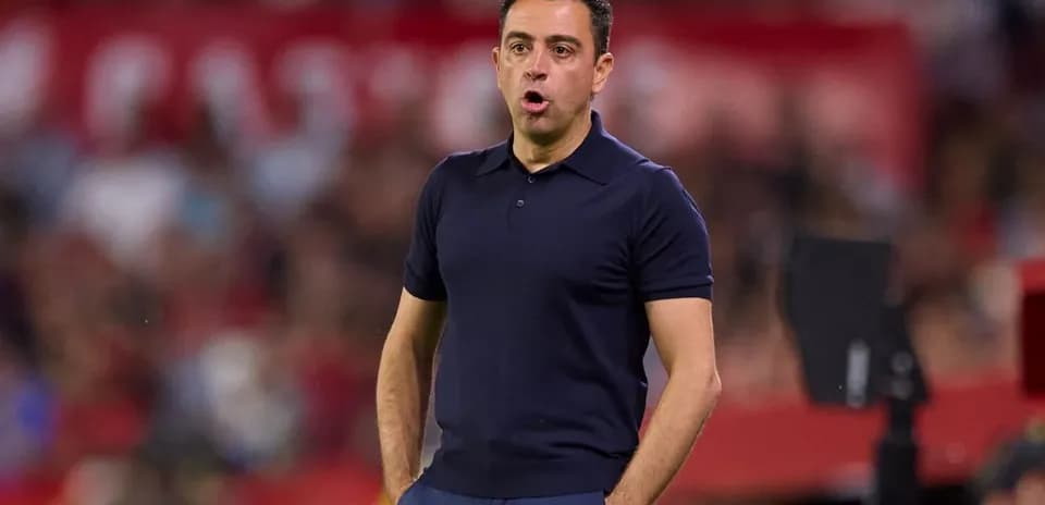 Coach giving instructions on the sidelines during match