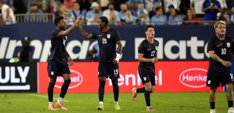 USA players celebrating a goal during match