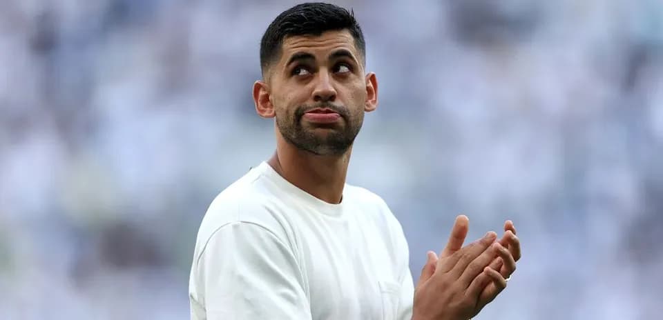 Player clapping hands during pre-match warm-up