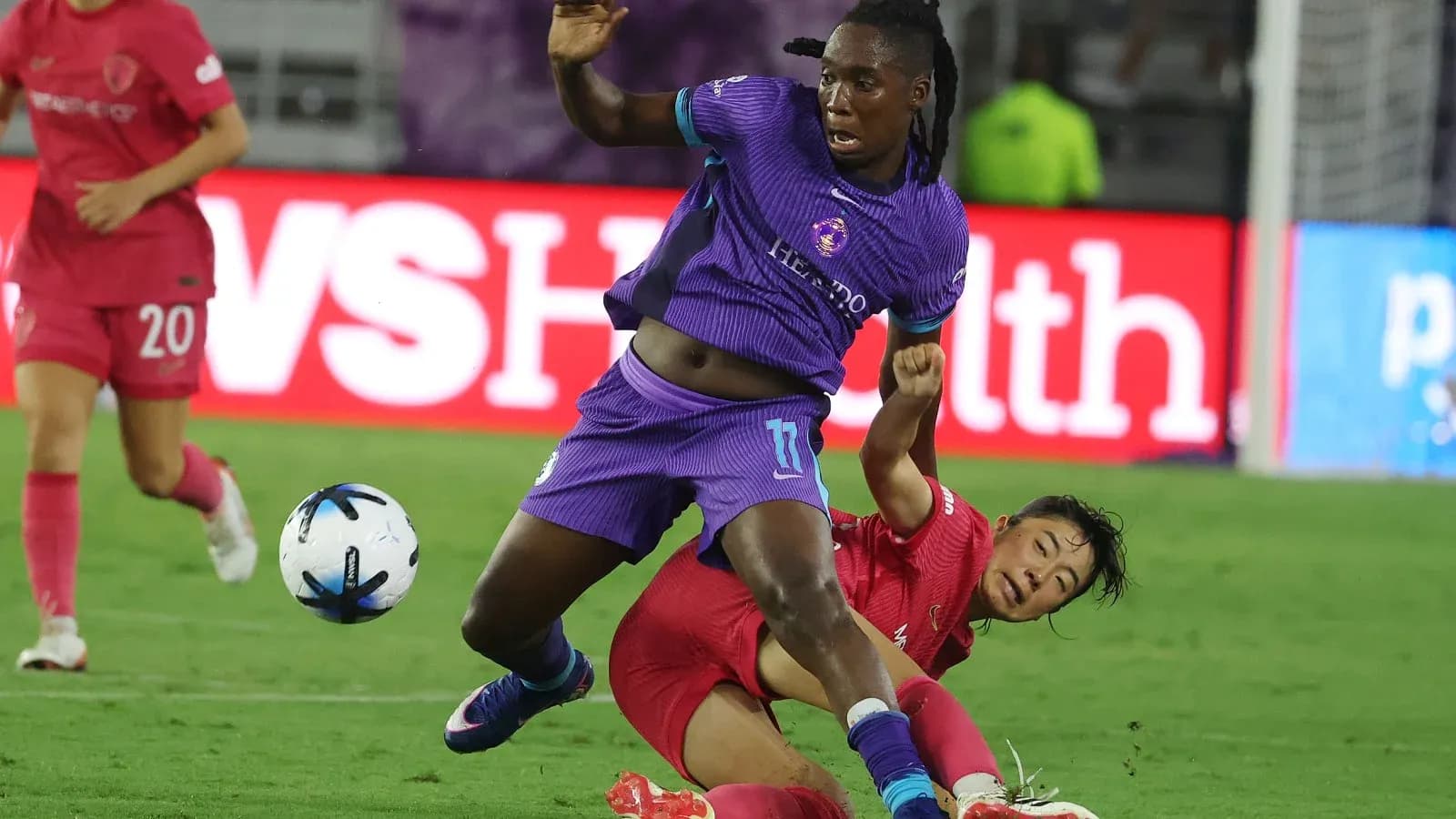 Orlando Pride player tackled by North Carolina Courage player