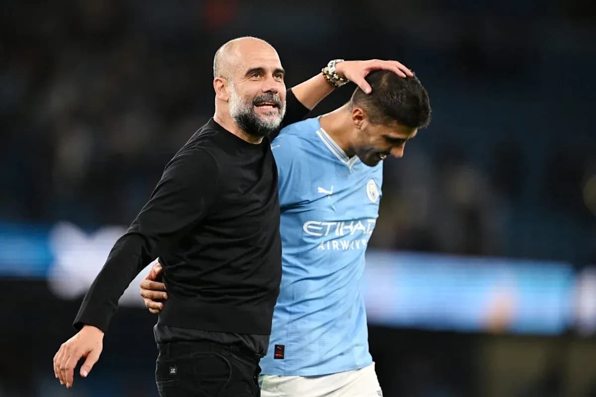 Coach and player celebrating after match victory