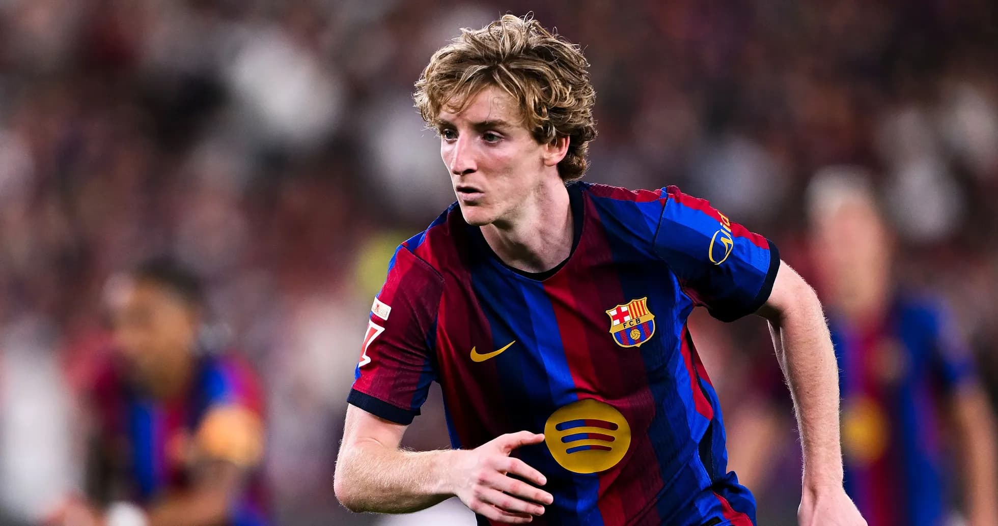 Player running during a match for FC Barcelona