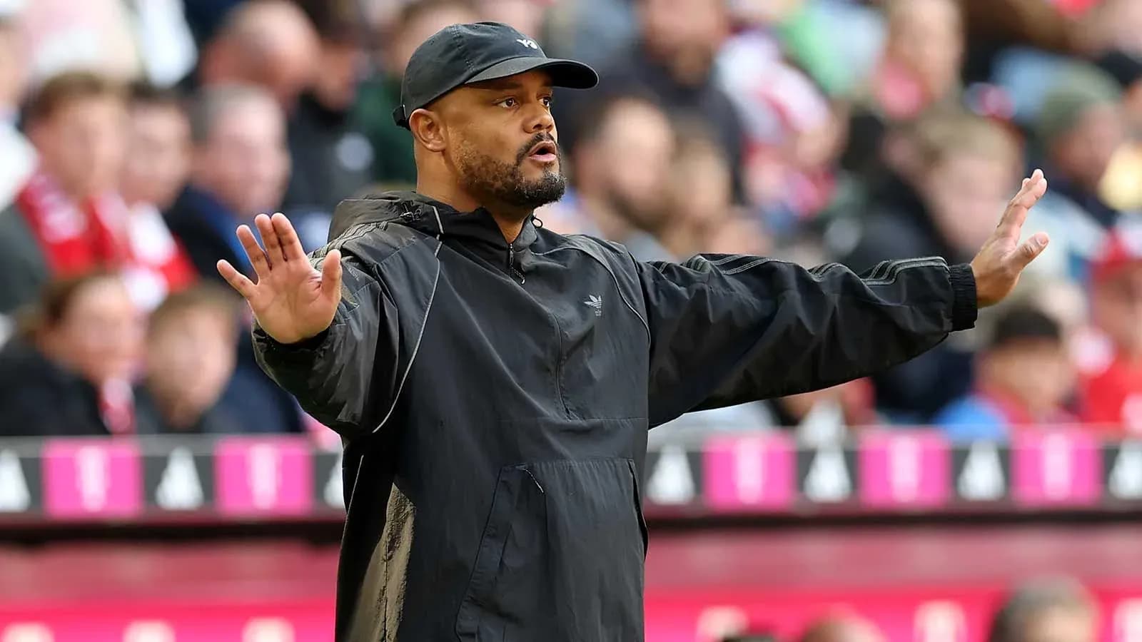 Coach giving instructions on the sidelines during match