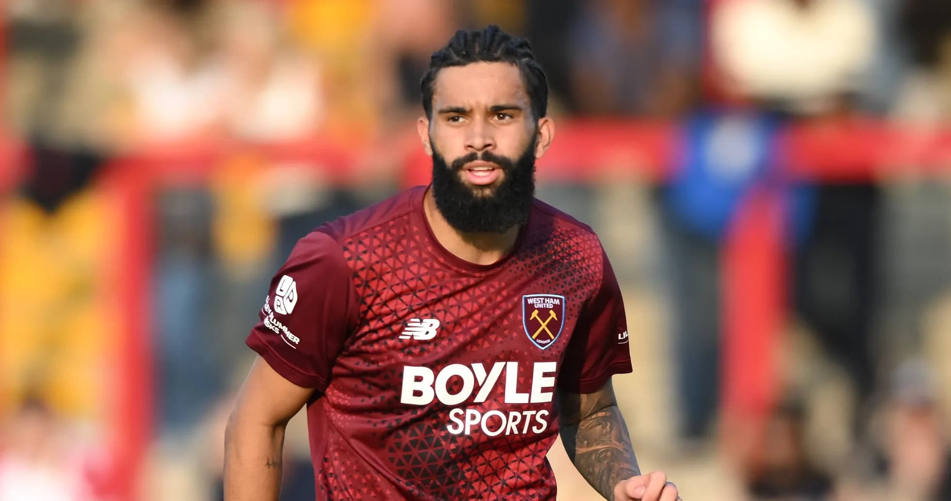 Player wearing West Ham United kit during match