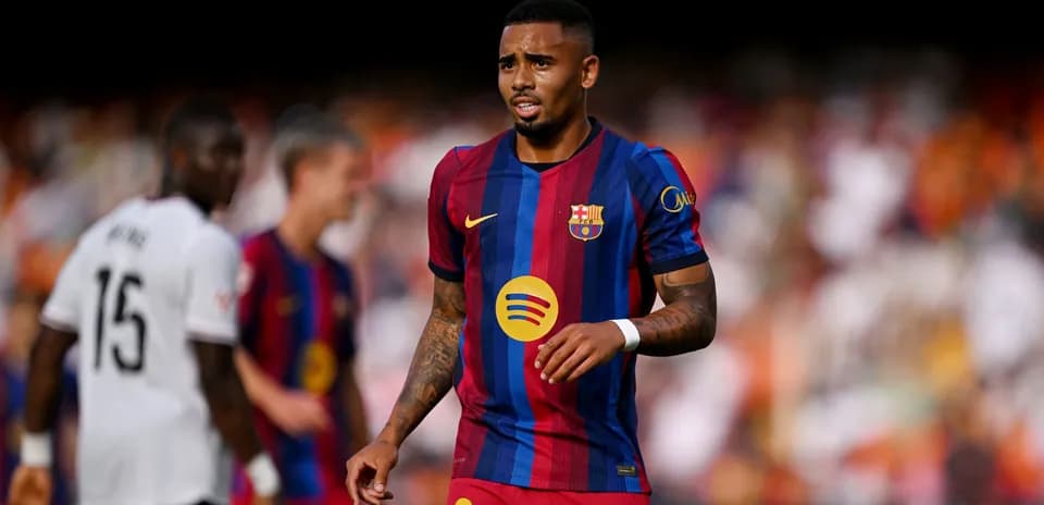 Player wearing Barcelona jersey on the pitch