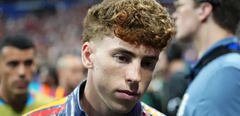 Young player walking through crowd after match