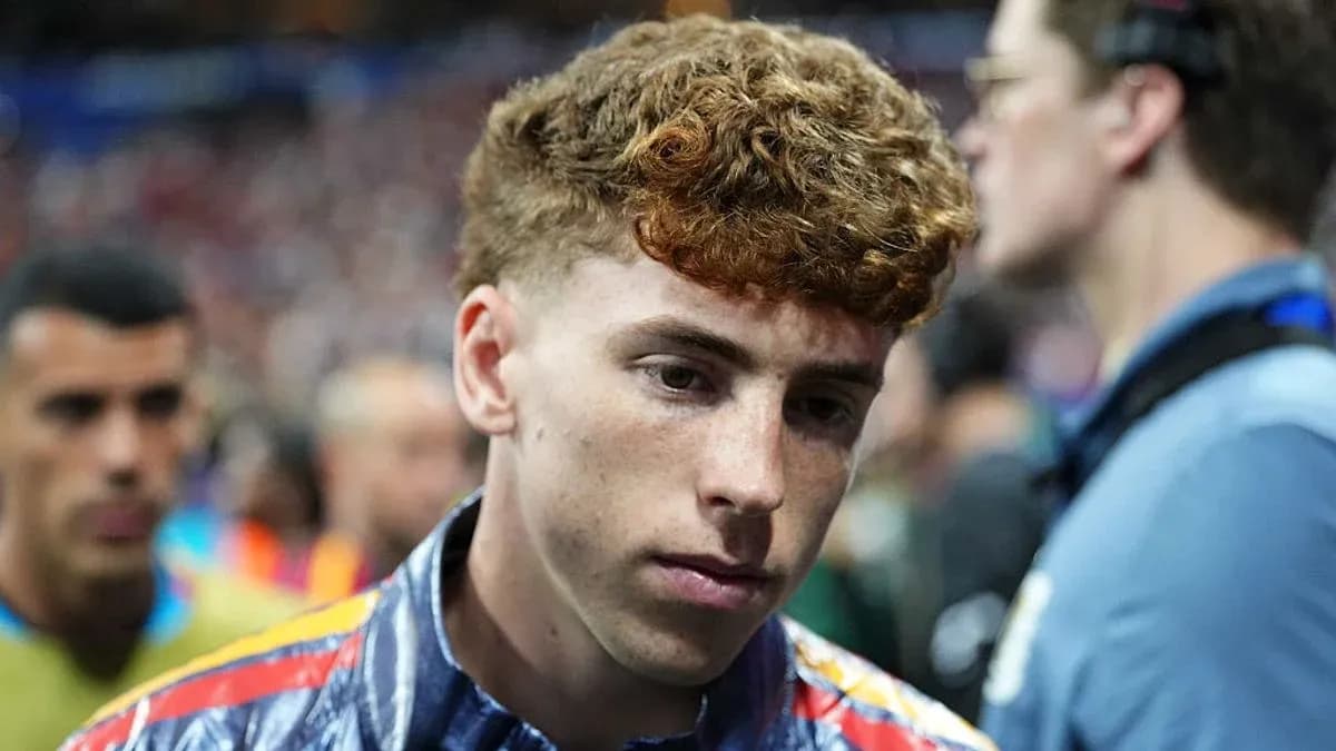 Young player walking through crowd after match
