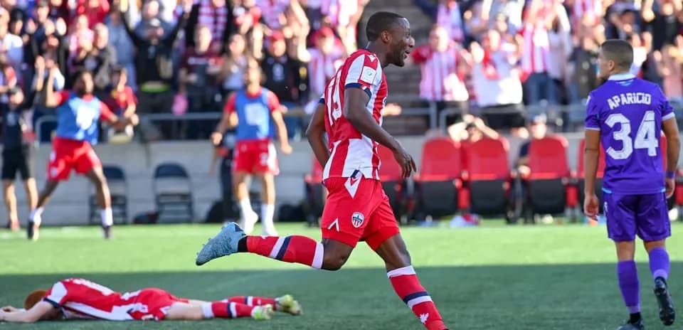 Player celebrating goal during Atlético Ottawa match