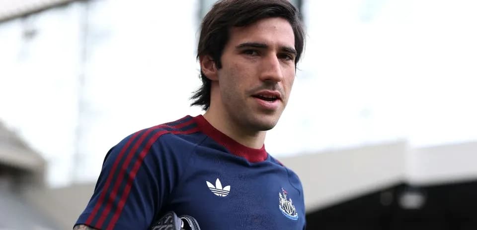 Player wearing Newcastle training kit at stadium