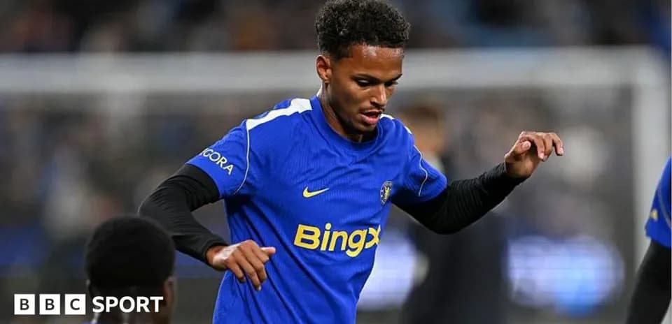 Player warming up in blue team kit before match