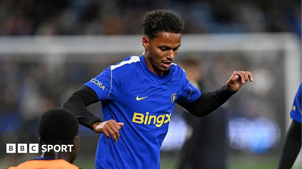 Player warming up in blue team kit before match