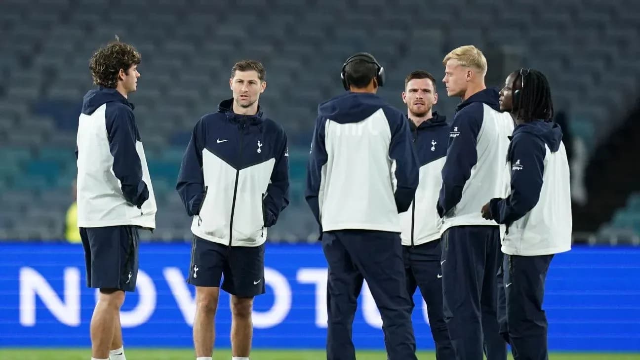 Tottenham players discussing on the pitch before match