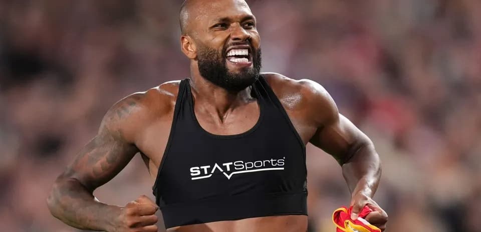 Athlete celebrating with jersey after a competition