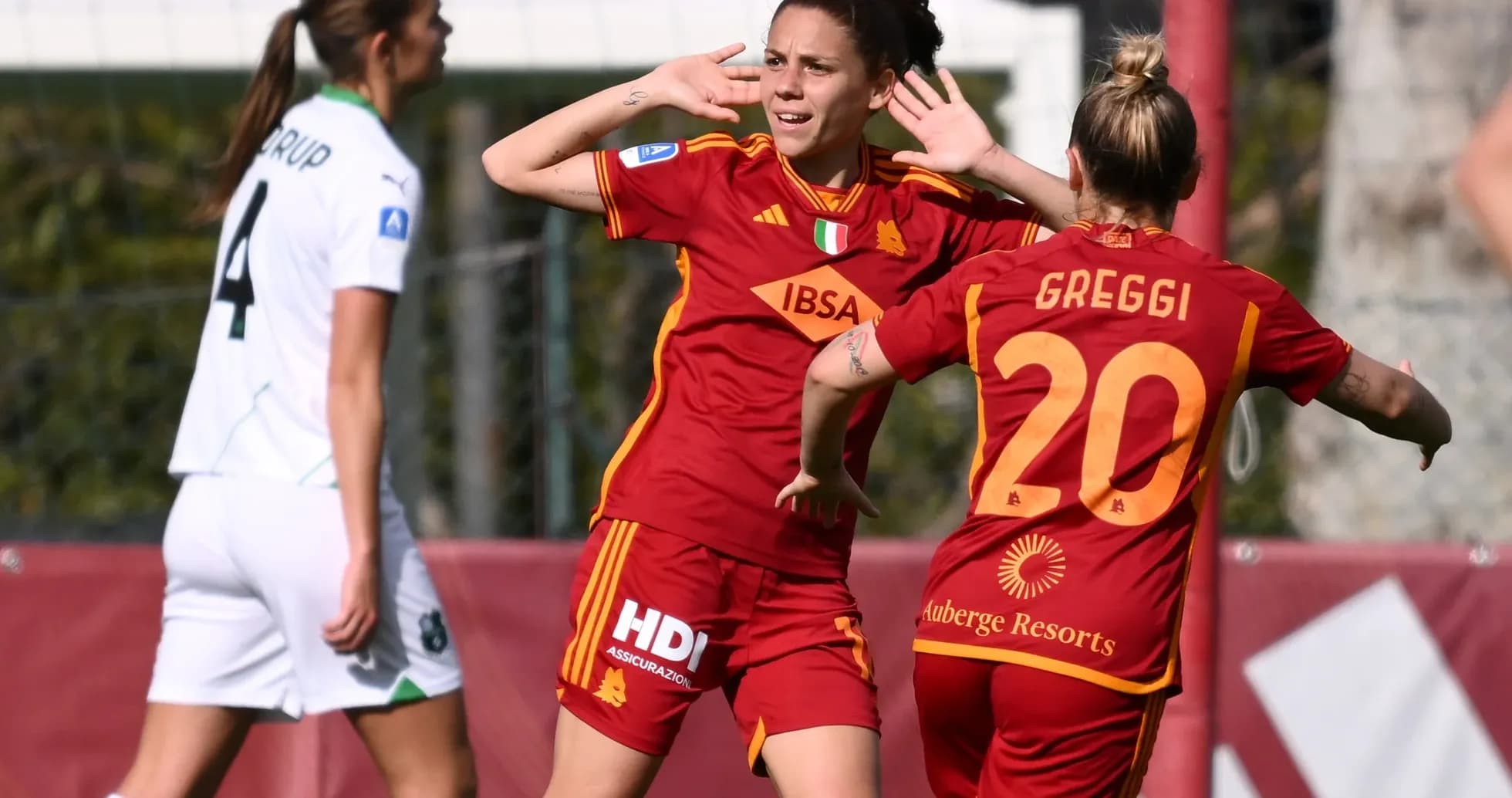 Roma W players celebrating a goal during match