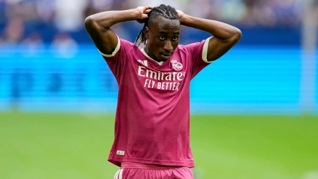 Player in pink jersey reacting during a match