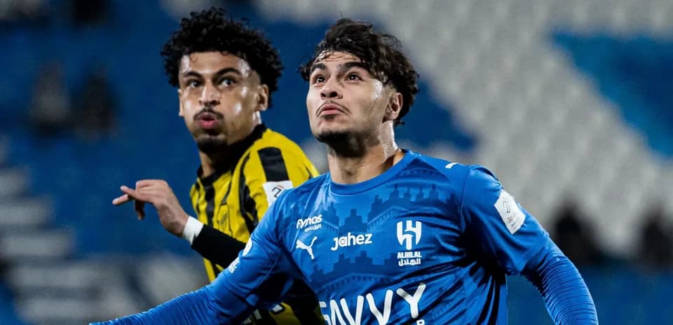 Two players from Al Hilal and Ittihad in action