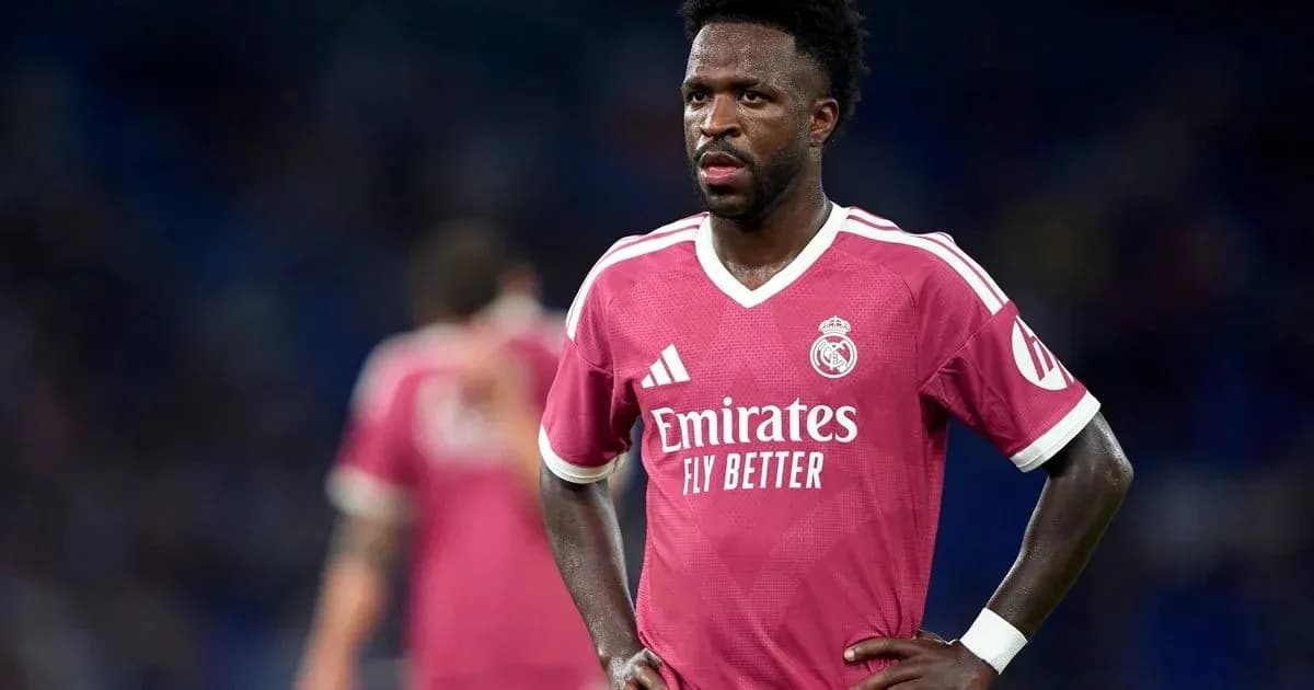 Player in pink Real Madrid jersey during match