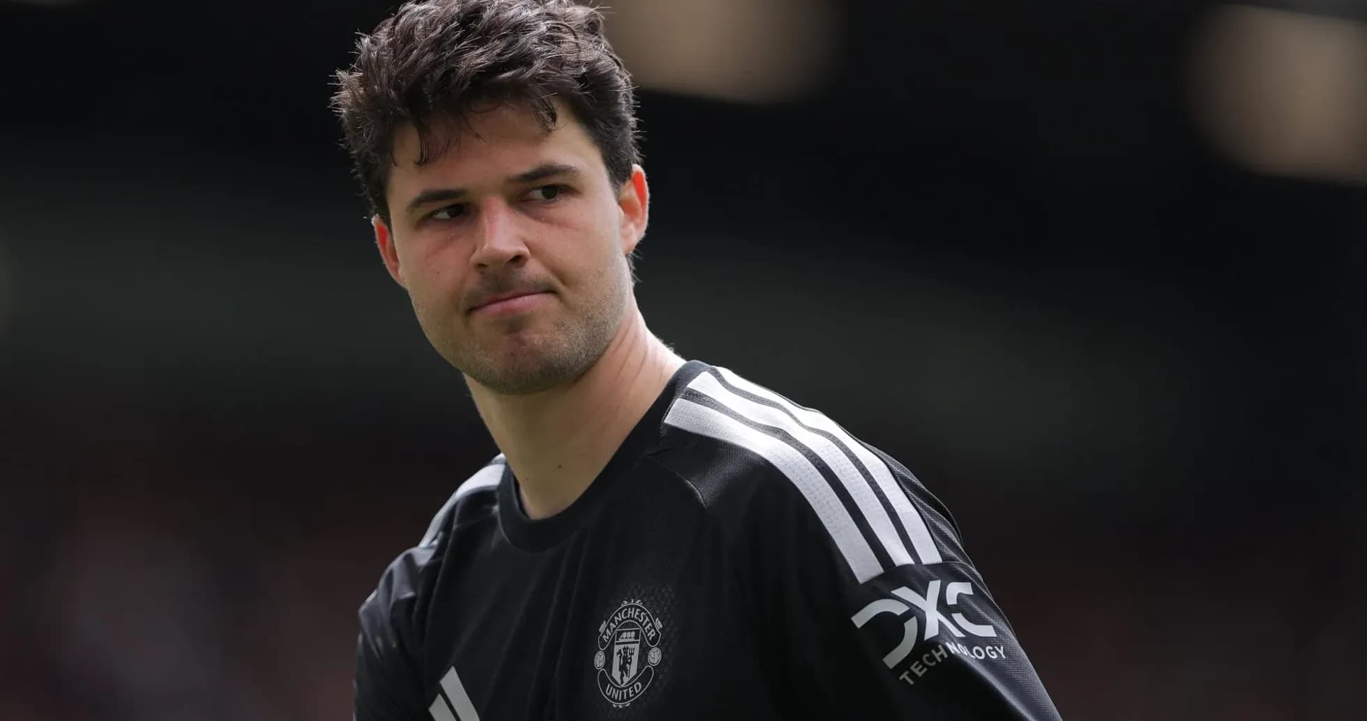 Goalkeeper in Manchester United kit on the pitch