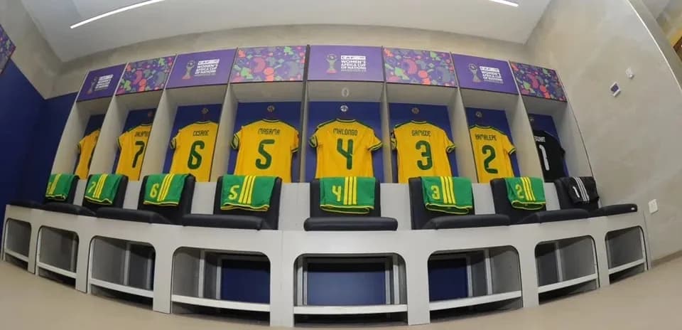 Changing room with yellow jerseys for players