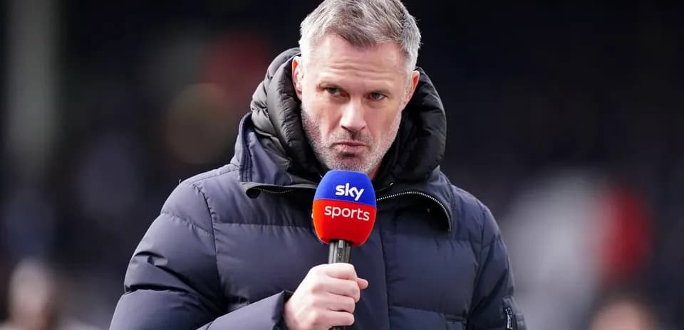 Sports commentator holding microphone during broadcast