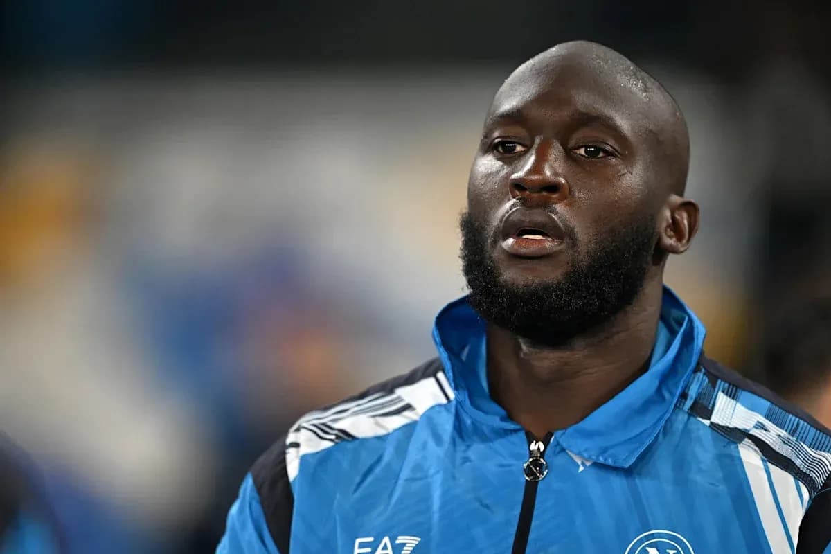 Player in Napoli training jacket before match