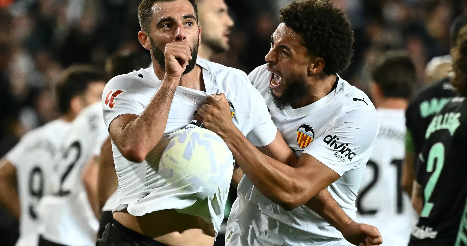 Valencia players celebrating a goal in La Liga