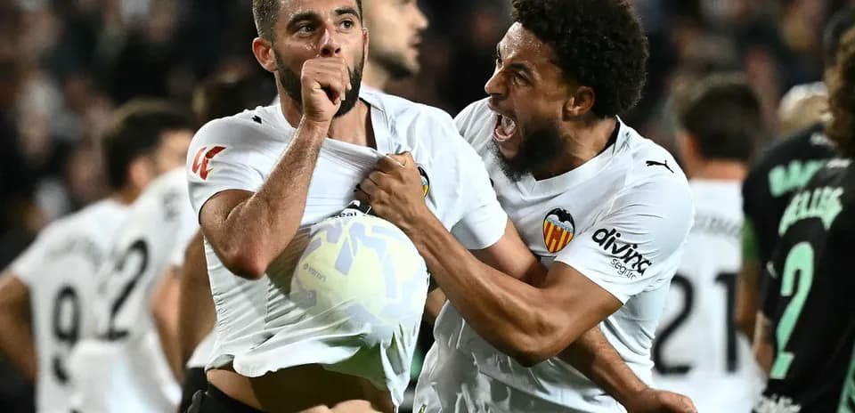 Valencia players celebrating a goal in La Liga