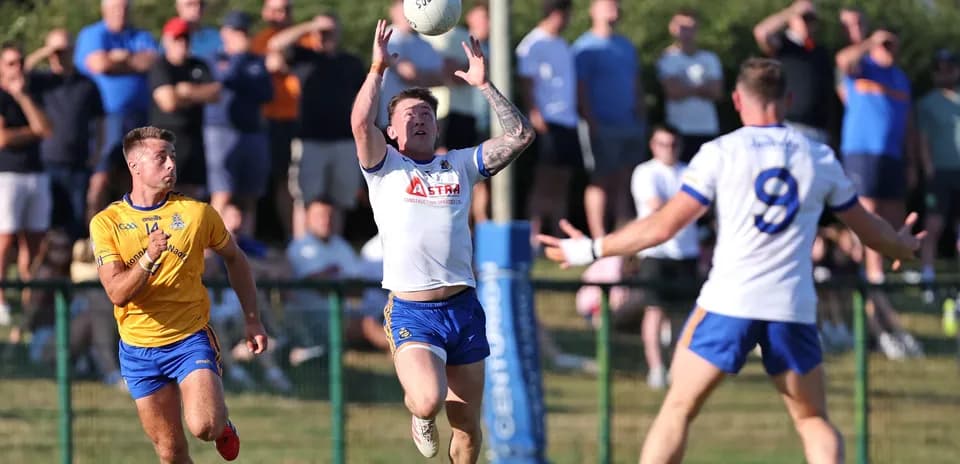 Player catching a ball during a match