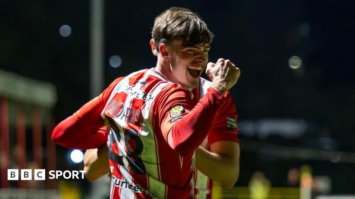 Player celebrating a goal with clenched fist