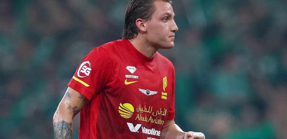 Player wearing red jersey during a match