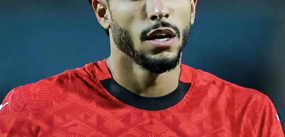 Player in red Egypt jersey during match
