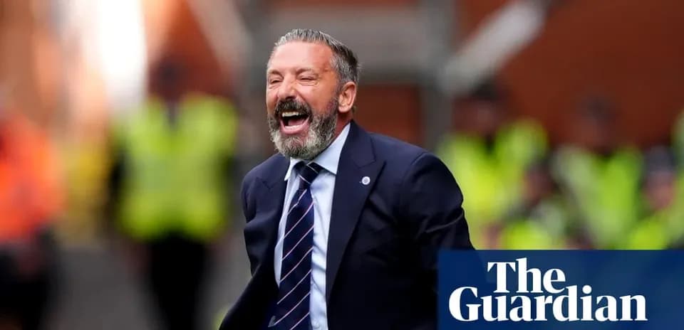 Manager celebrating during a match on the sidelines