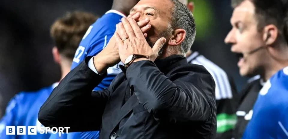 Coach reacting passionately during a match